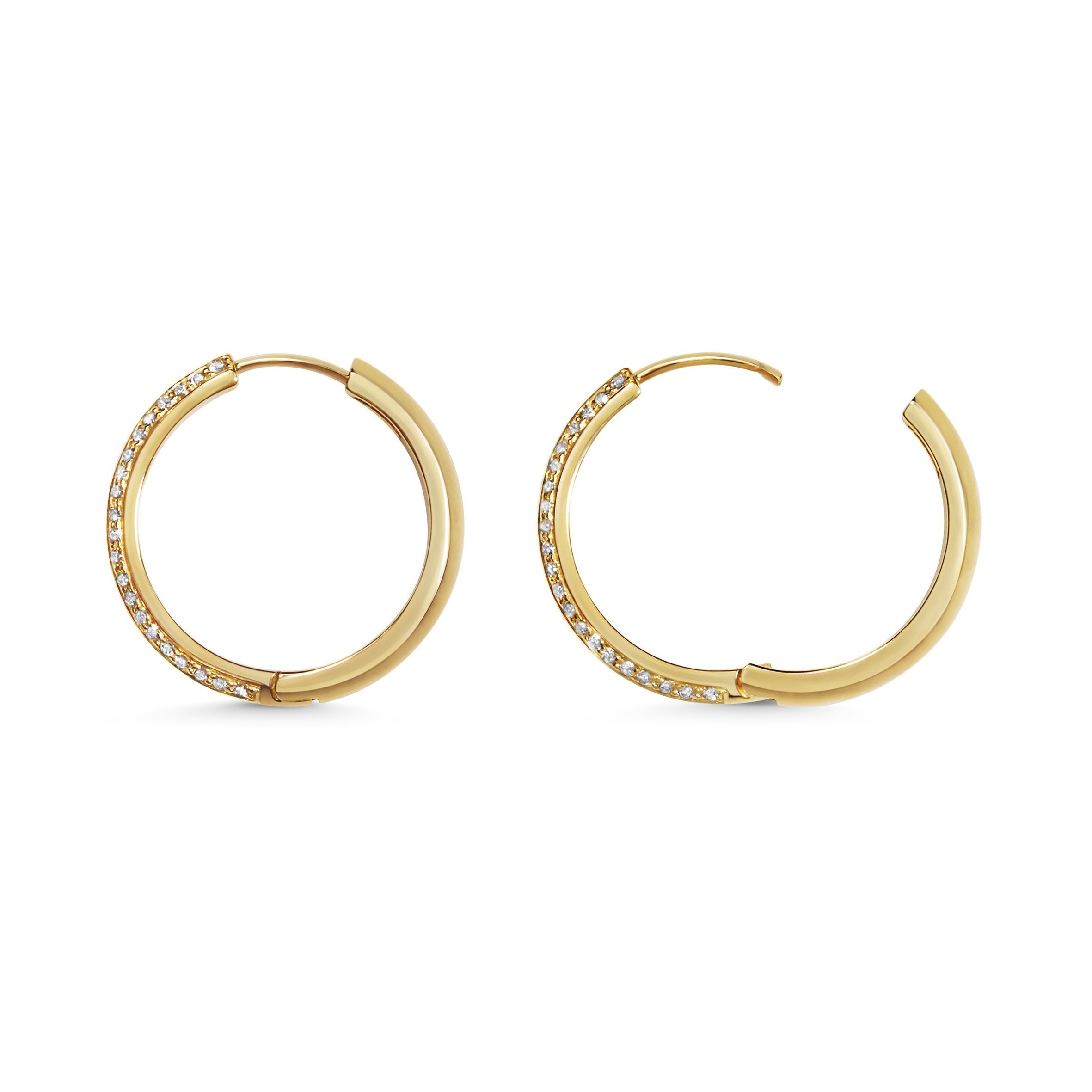 The 20mm Diamond Knife Edge Hoop Earrings by East London jeweller Rachel Boston | Discover our collections of unique and timeless engagement rings, wedding rings, and modern fine jewellery.