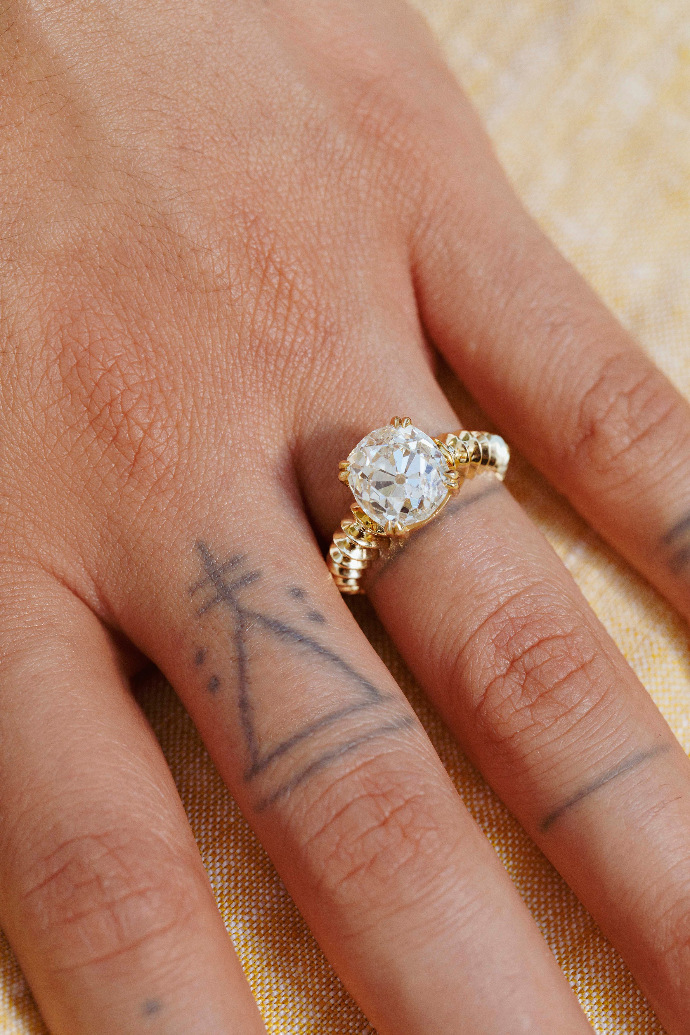 The X - Suadela Ring by East London jeweller Rachel Boston | Discover our collections of unique and timeless engagement rings, wedding rings, and modern fine jewellery.