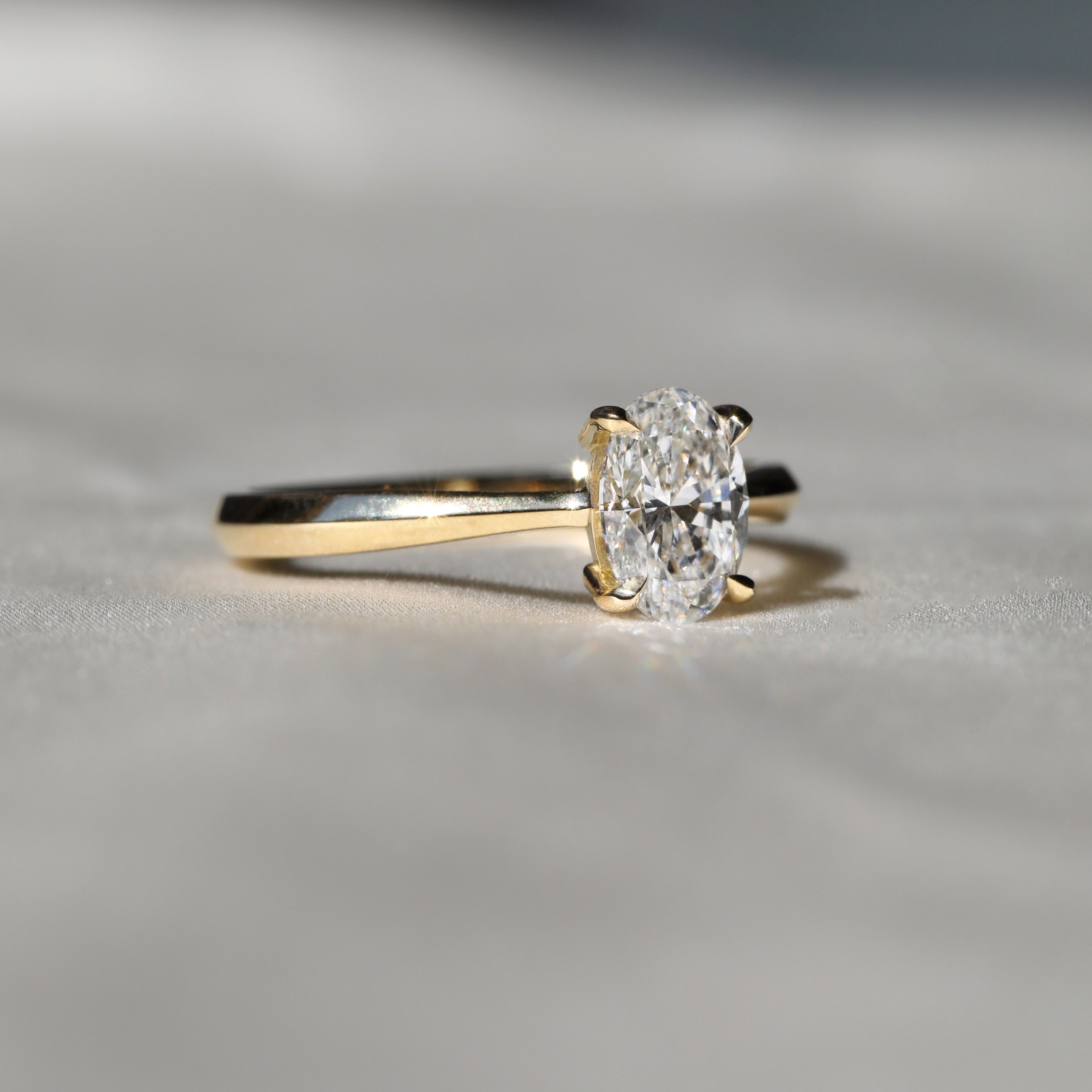 The Joy Ring - Oval Cut by East London jeweller Rachel Boston | Discover our collections of unique and timeless engagement rings, wedding rings, and modern fine jewellery.
