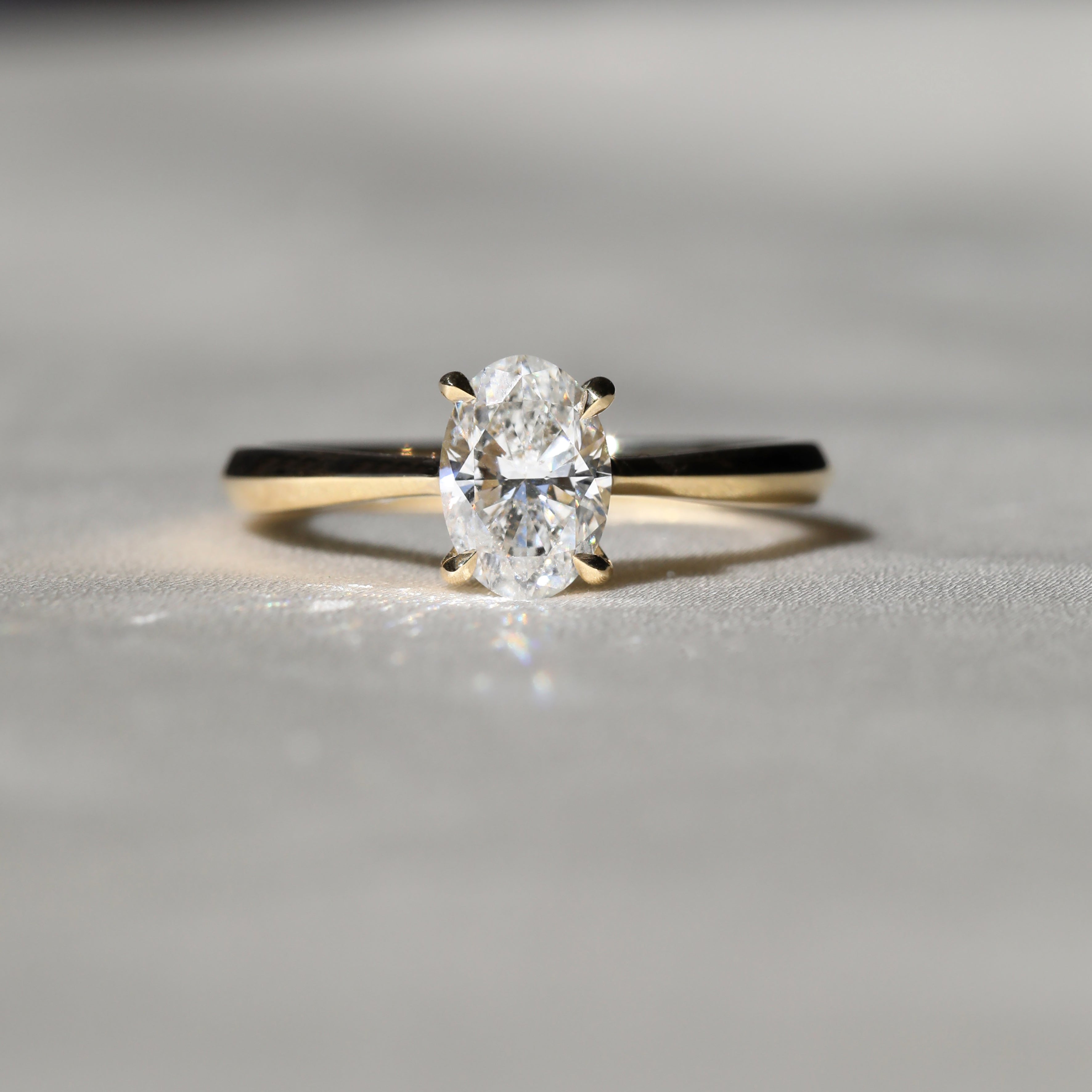The Joy Ring - Oval Cut by East London jeweller Rachel Boston | Discover our collections of unique and timeless engagement rings, wedding rings, and modern fine jewellery.