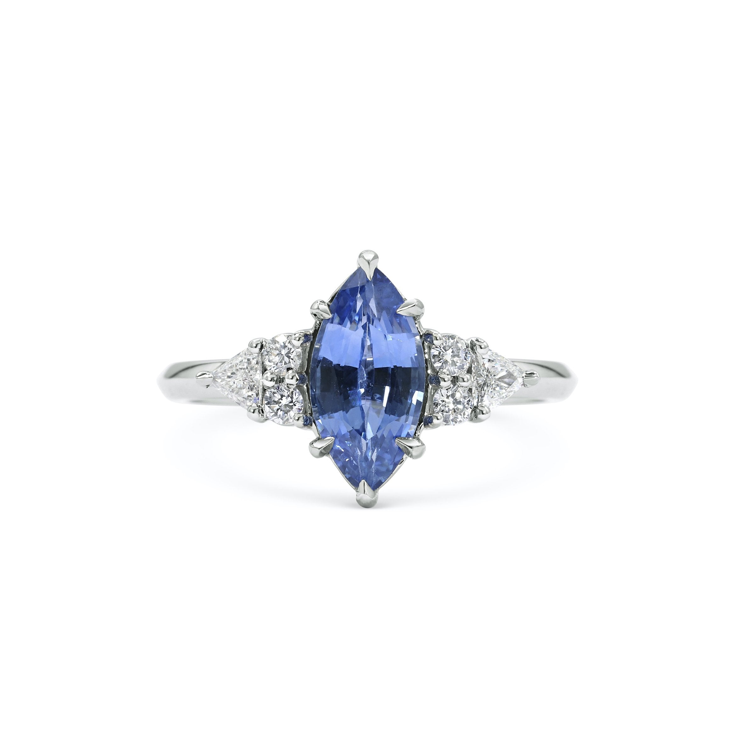 The X - Lois Sapphire Ring by East London jeweller Rachel Boston | Discover our collections of unique and timeless engagement rings, wedding rings, and modern fine jewellery.