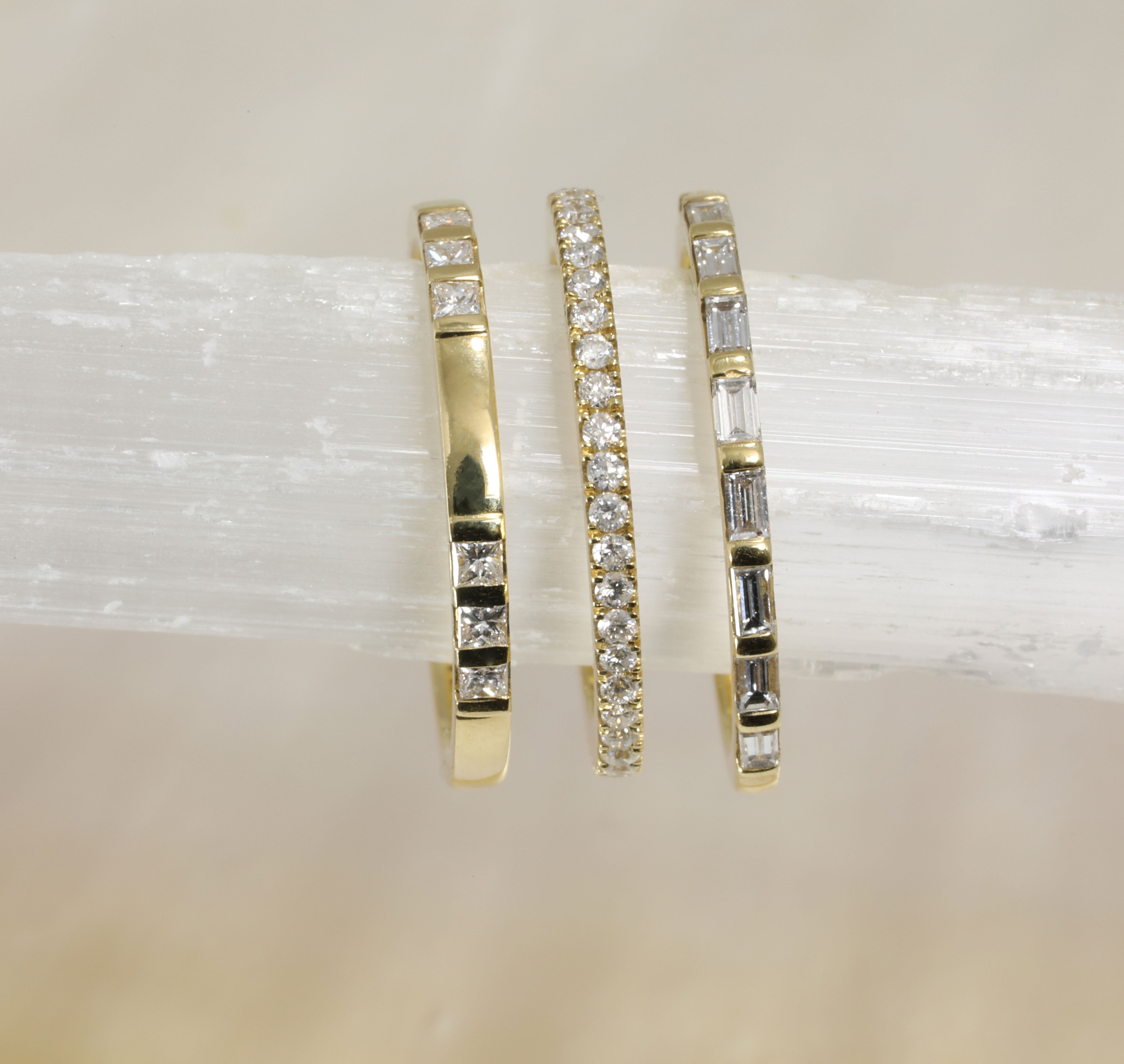 The Princess Cut Trio Wedding Band by East London jeweller Rachel Boston | Discover our collections of unique and timeless engagement rings, wedding rings, and modern fine jewellery.