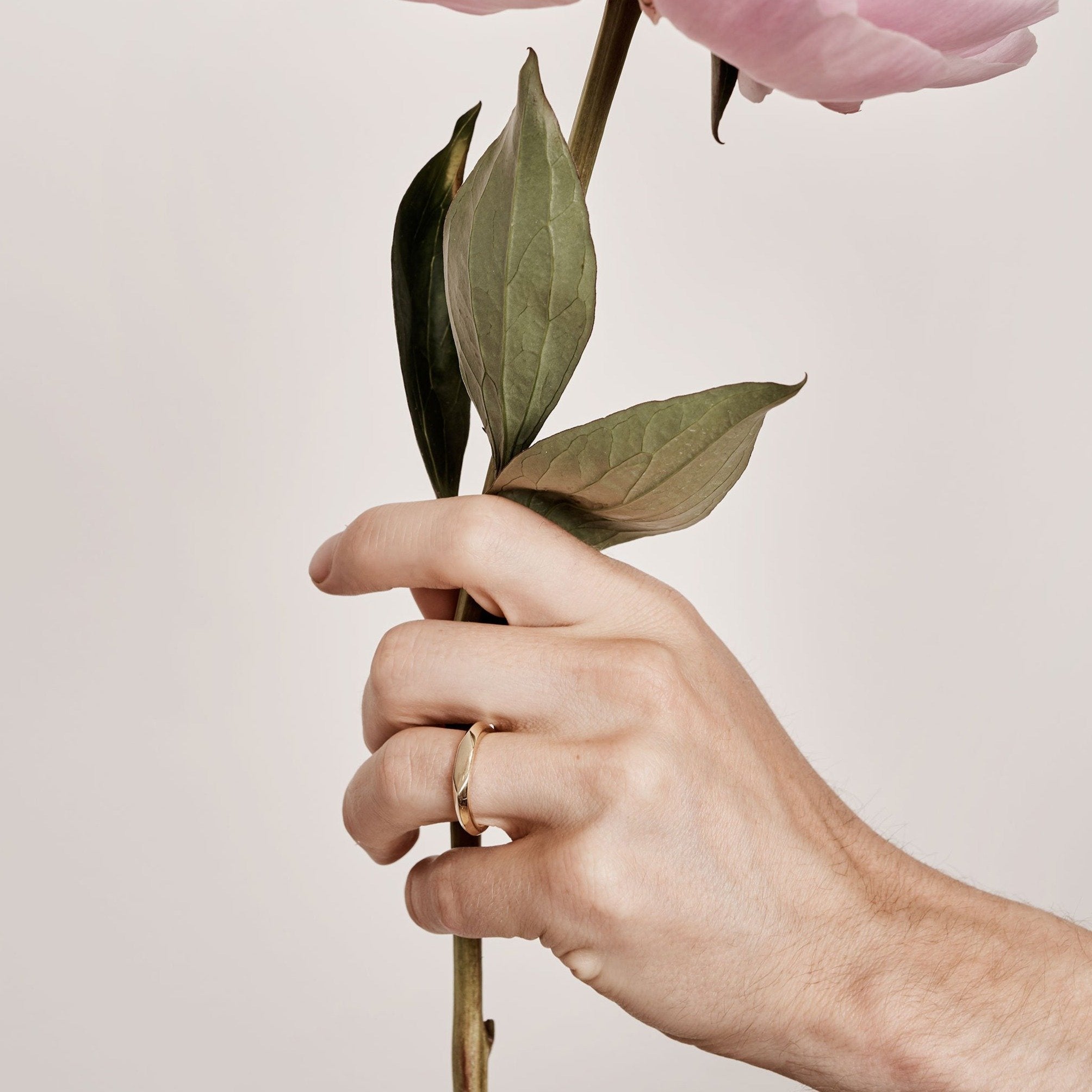 The Slim Signet Tapered Ring by East London jeweller Rachel Boston | Discover our collections of unique and timeless engagement rings, wedding rings, and modern fine jewellery.